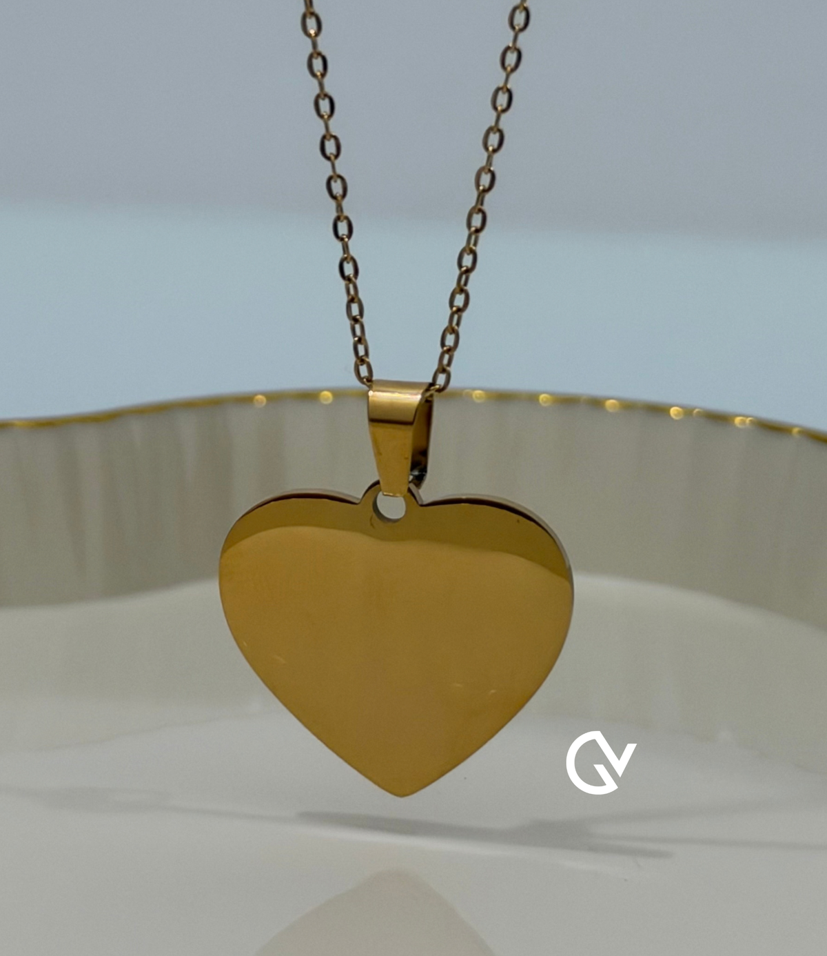 Collar con dije de corazón grabado